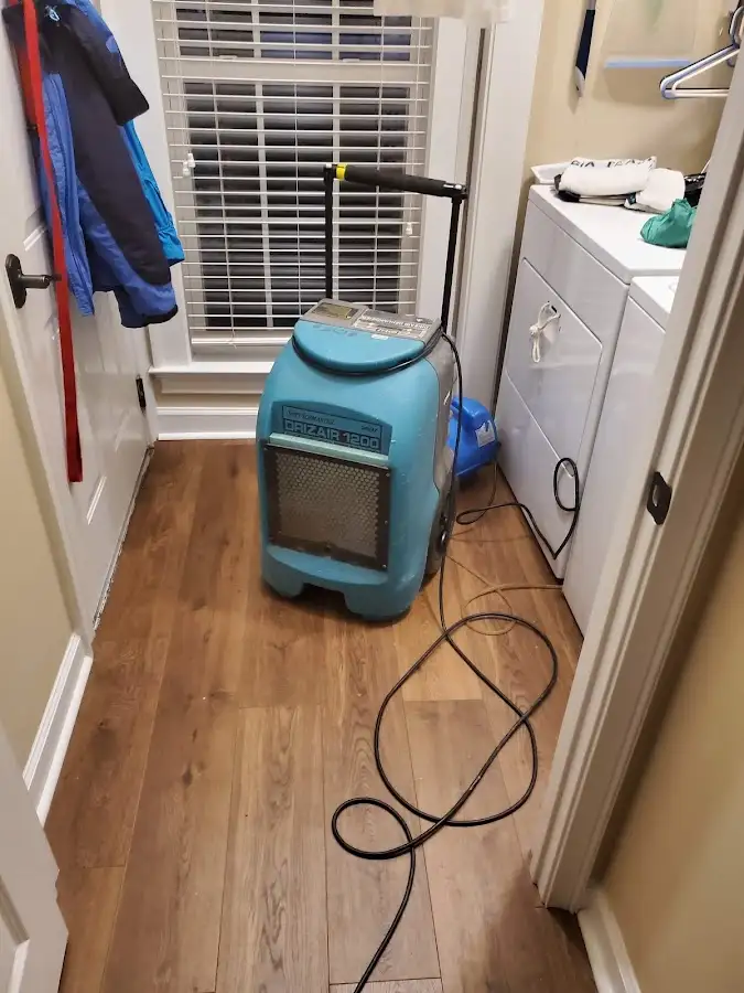 Commercial dehumidifier deployed for Flood Damage Cleanup in Brookhaven